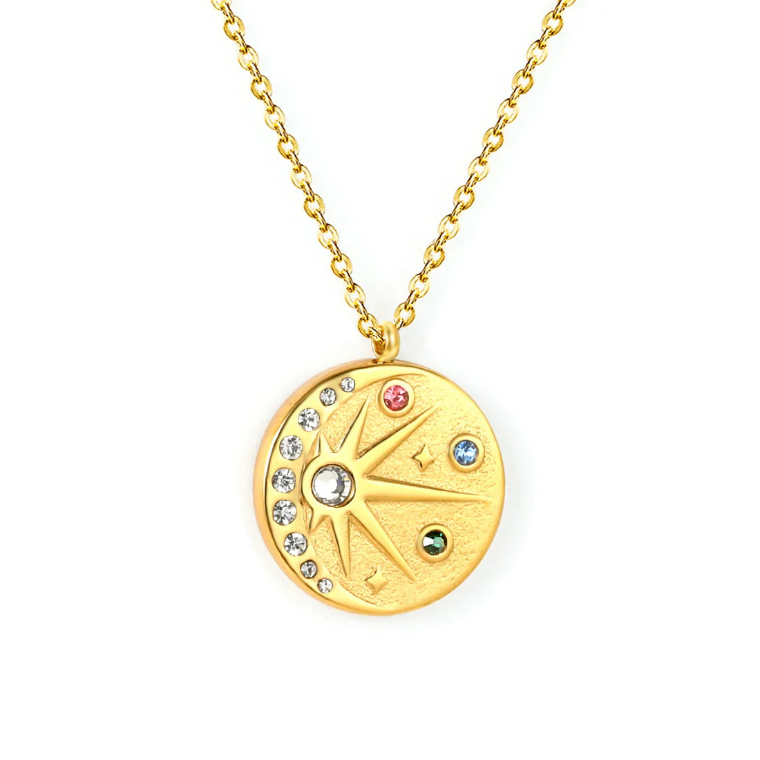 Gold necklace with a circular pendant featuring gemstones on a white background