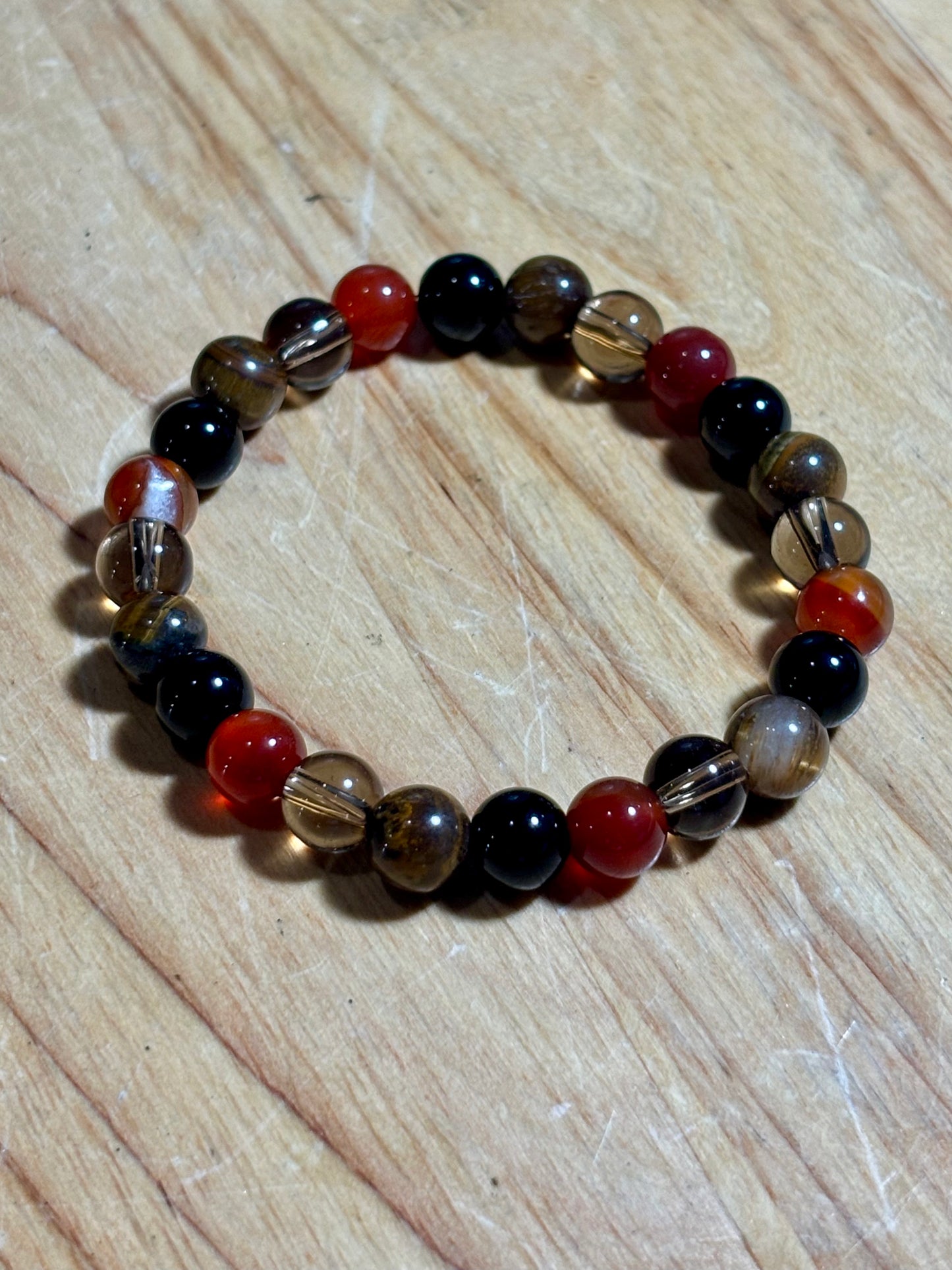 8mm Bl Obsidian, Carnelian, Sm Quartz, T Eye Bracelet
